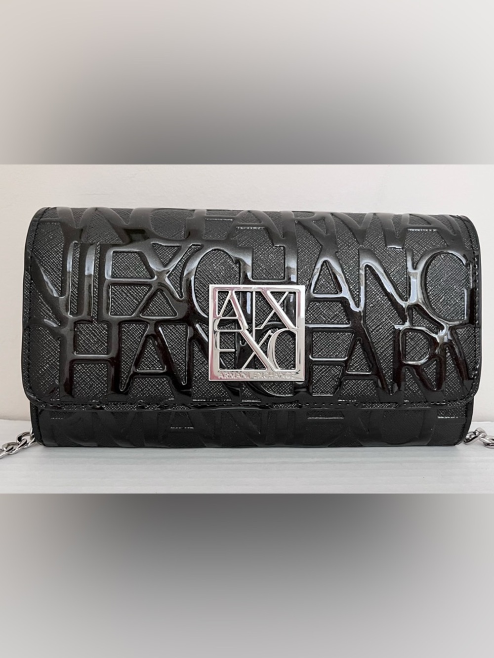 New Armani Exchange Black Patent Logo Clutch with Silver Emblem